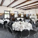 מלון Den Gamle